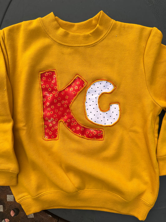 KC Reverse Appliqué Sweatshirt